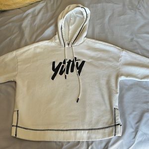 Tittle cream hooded sweatshirt with black stitching